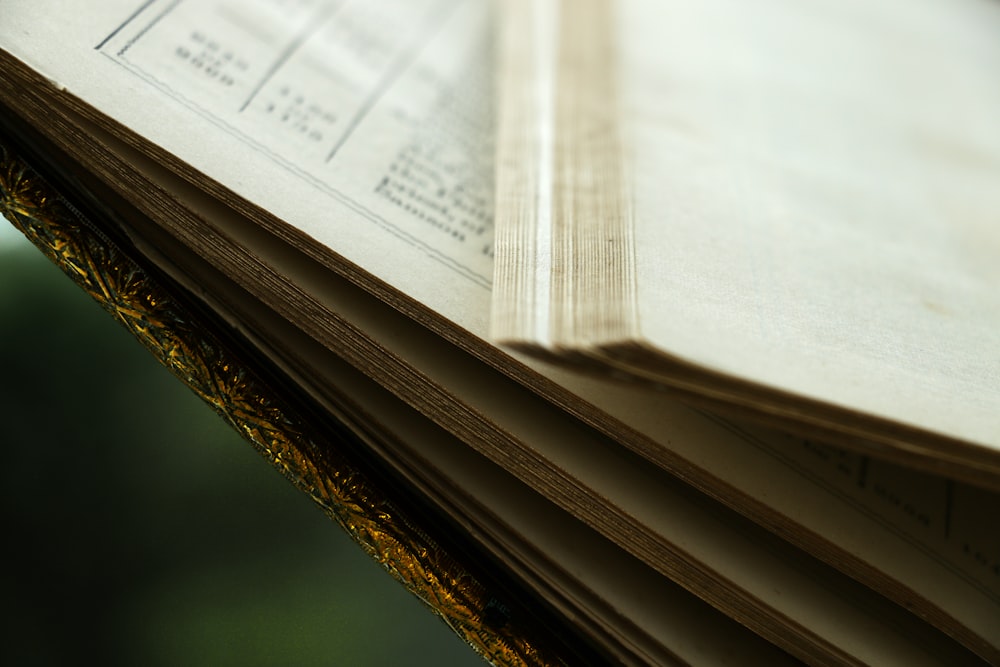 white paper document on brown wooden table