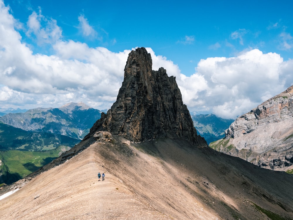 brown rocky mountain under blue sky during daytime