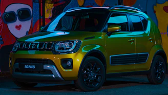 yellow car on road during daytime