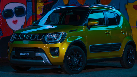 yellow car on road during daytime