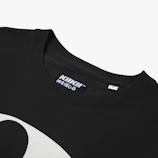 Front view of a zero-neck shirt with a subtle printed design on a model.