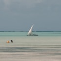 white sailboat on sea during daytime
