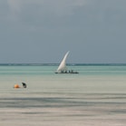 white sailboat on sea during daytime