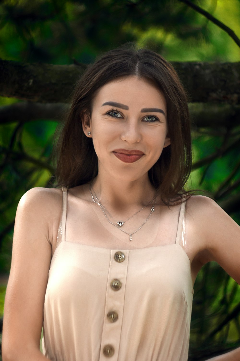 woman in white sleeveless top