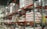 white and red cardboard boxes on shelf