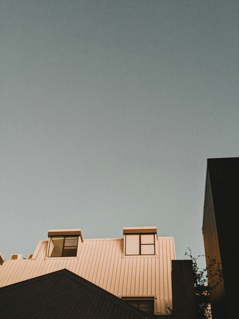 white concrete building under blue sky during daytime