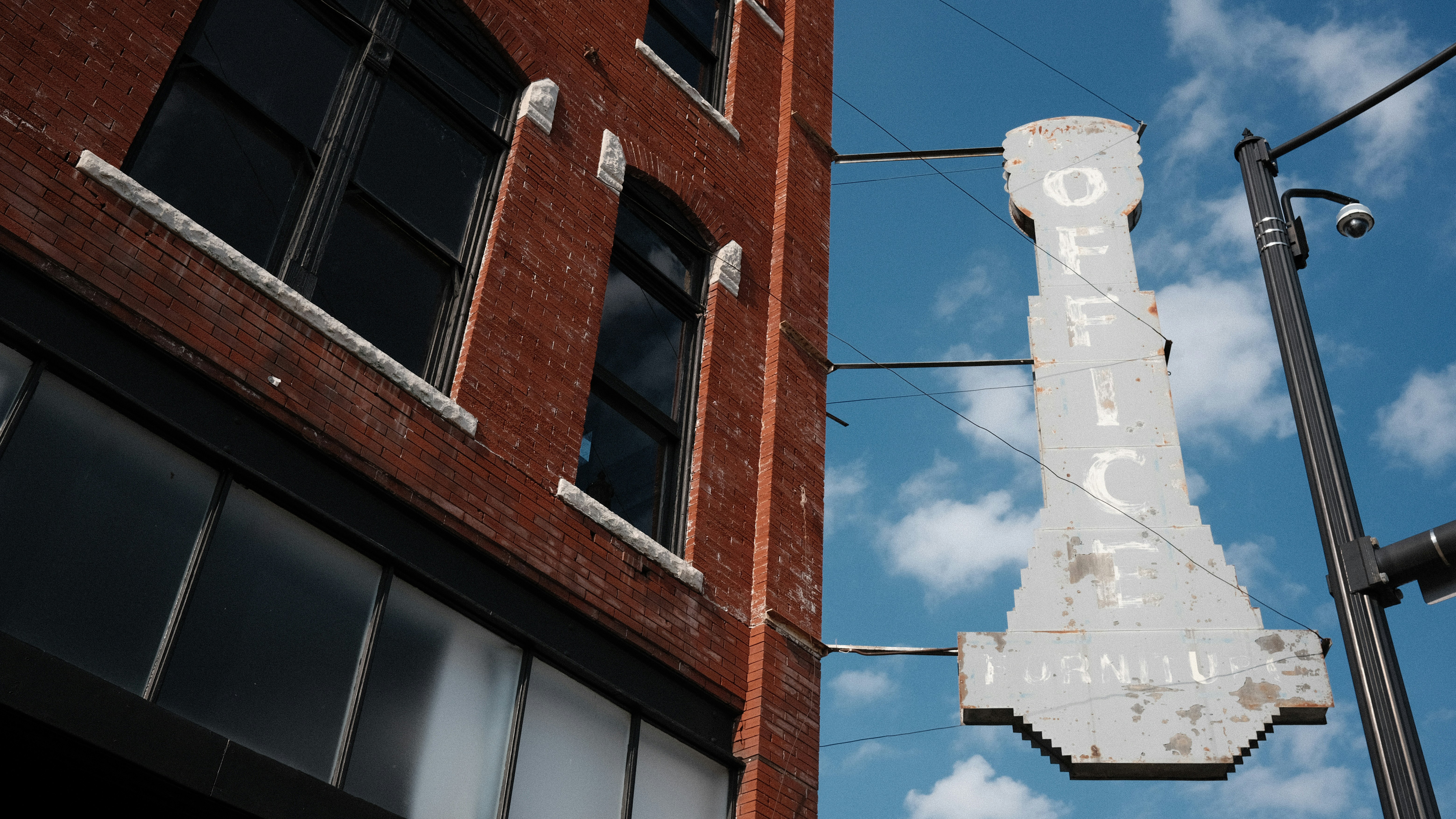 brown concrete building under blue sky during daytime