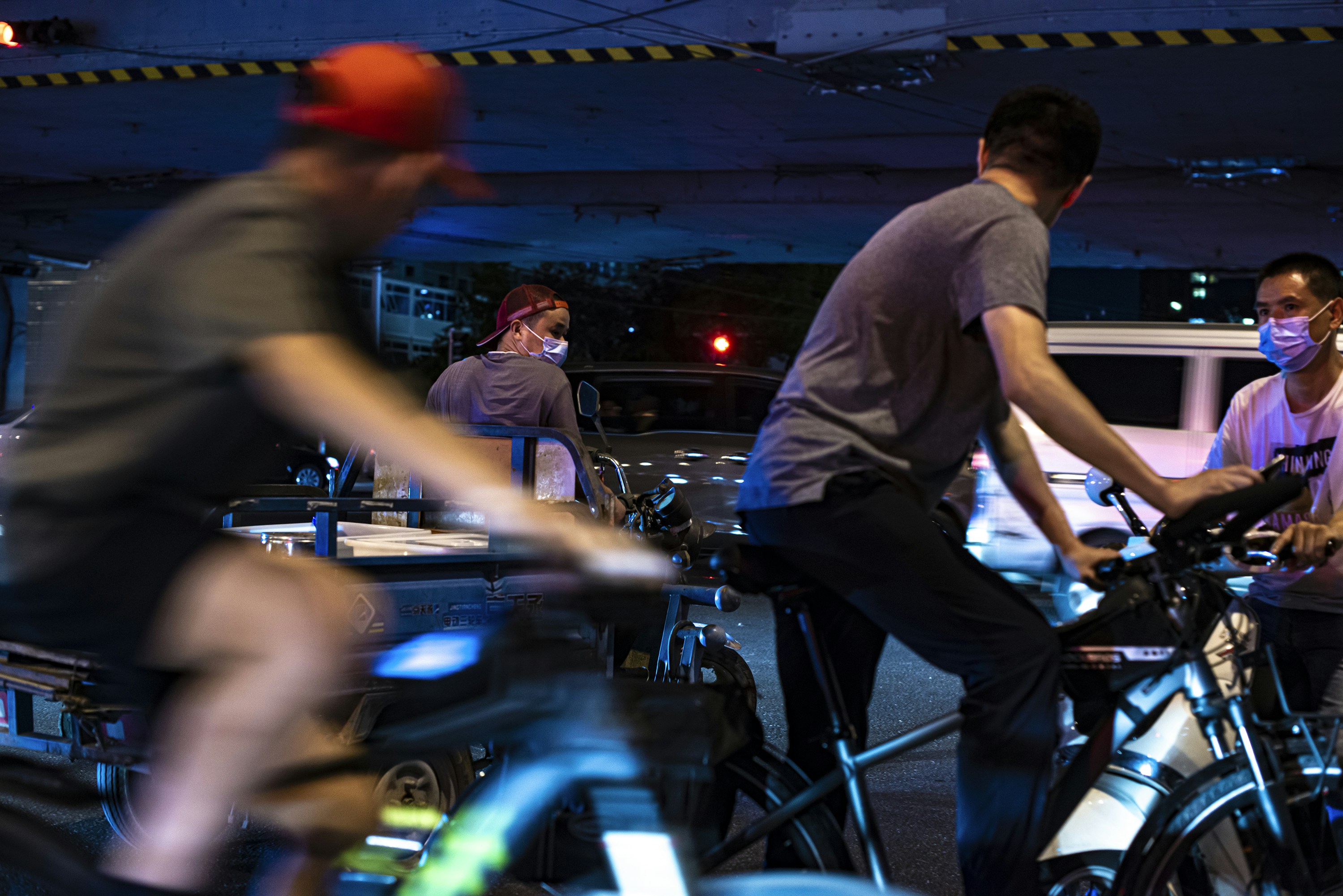 man in gray crew neck t-shirt playing dj mixer