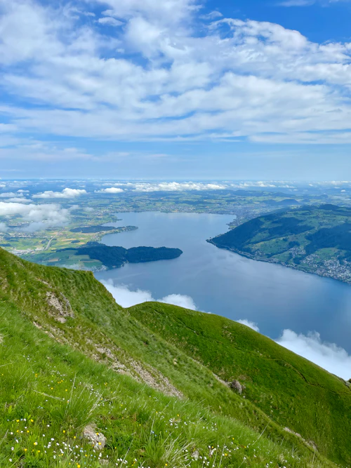 Green mountainside over Lake Lucerne