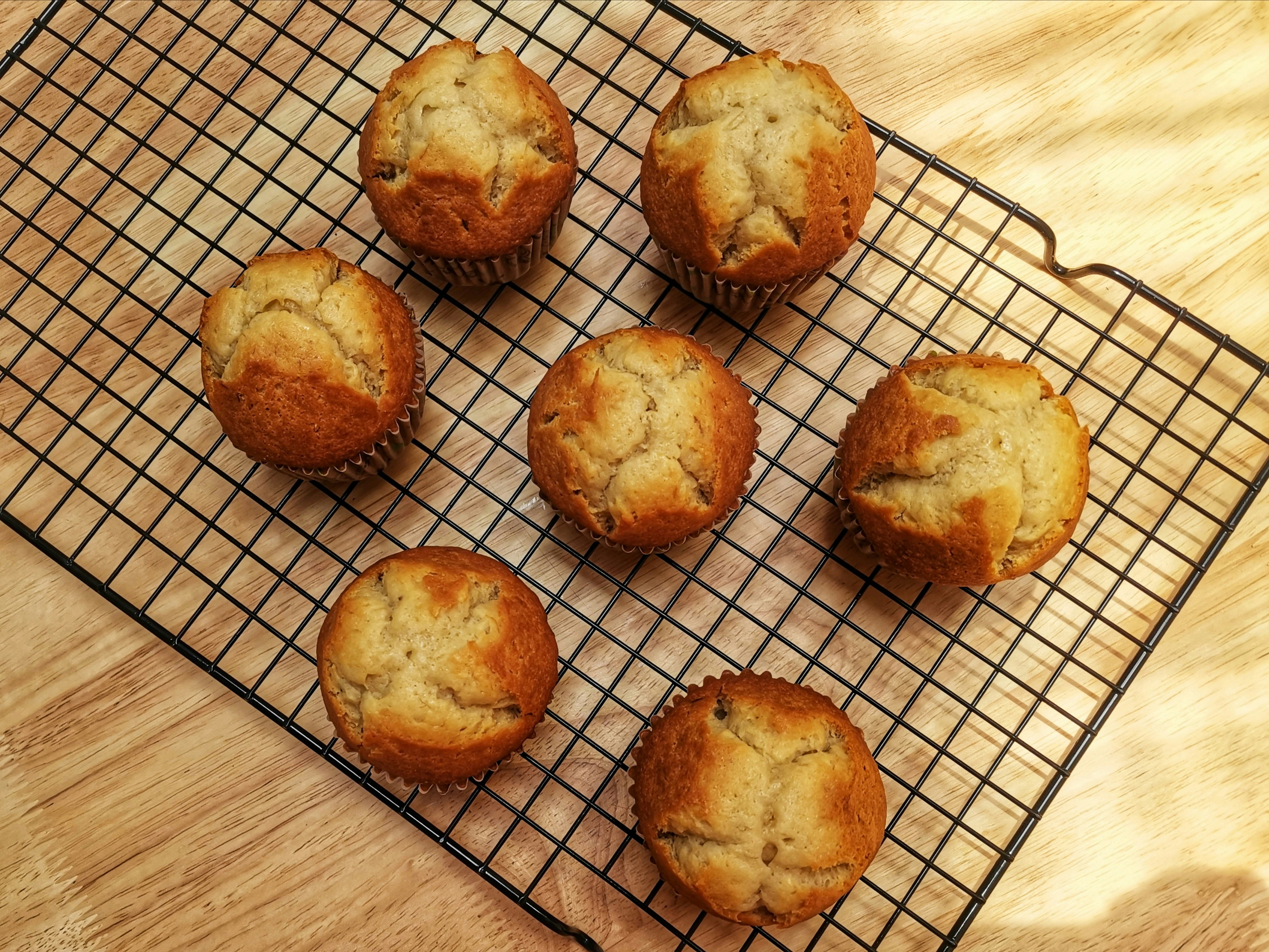 brown cookies on brown and white checkered textile