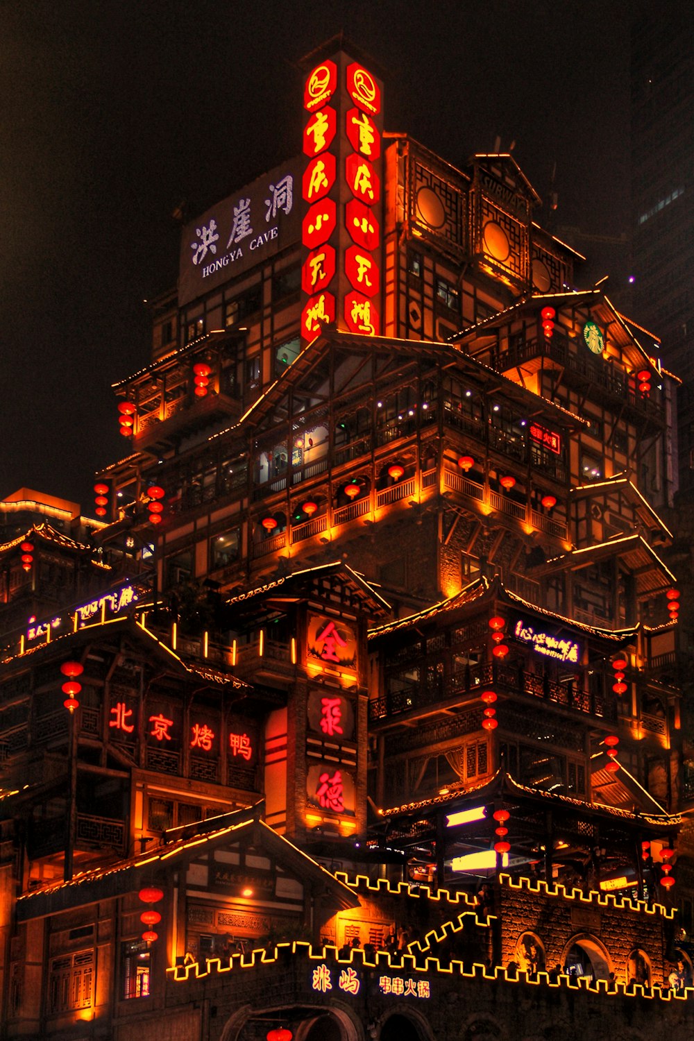 red and yellow lighted building during nighttime