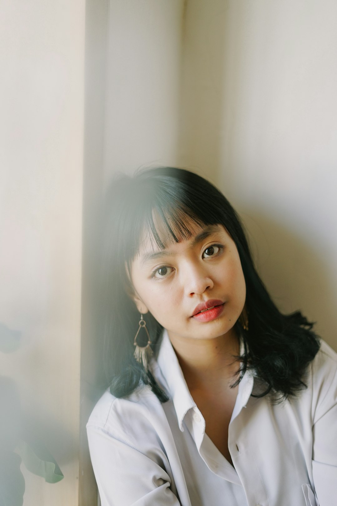 woman in white collared shirt