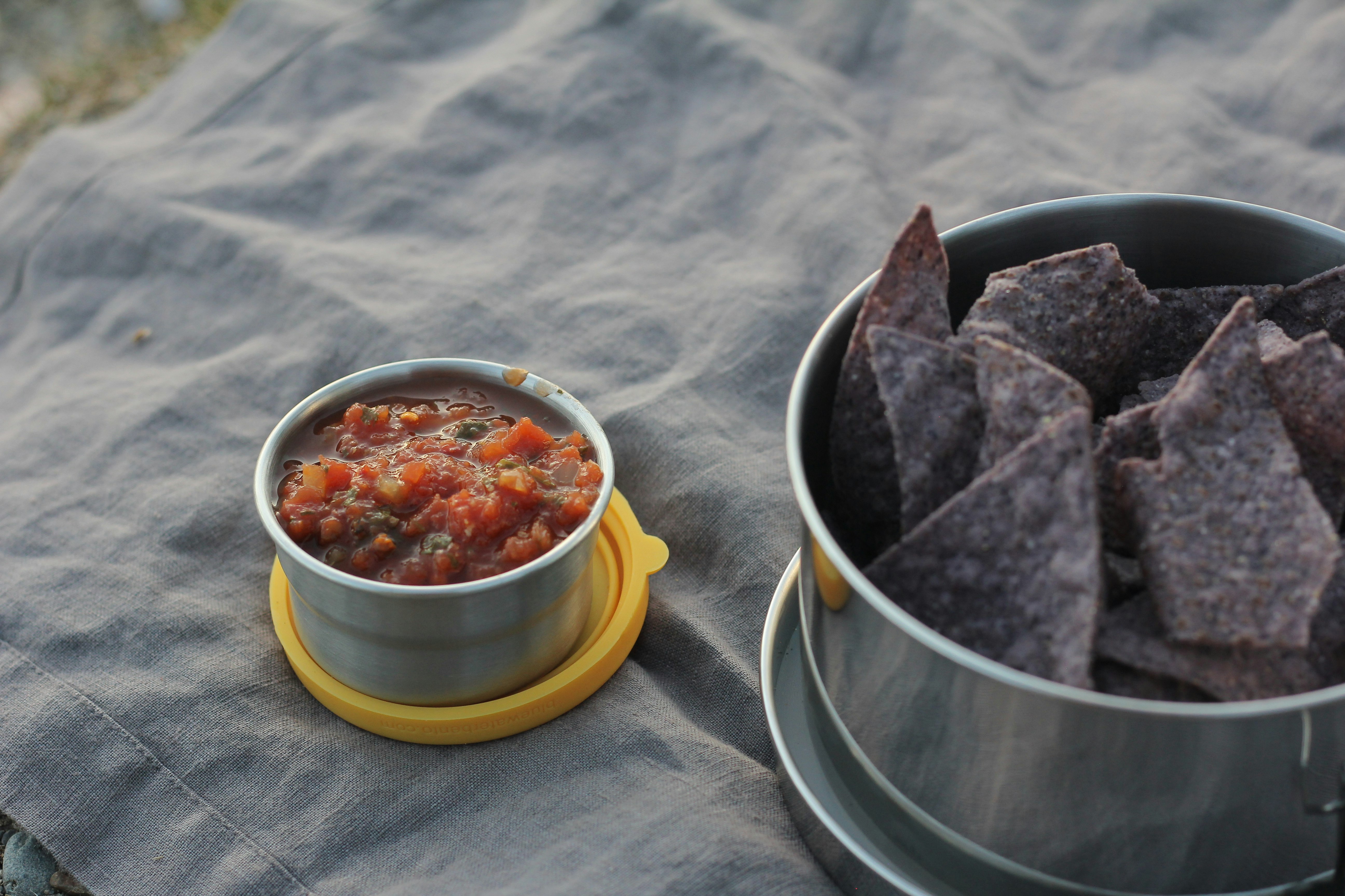 stainless steel bowl with red sauce