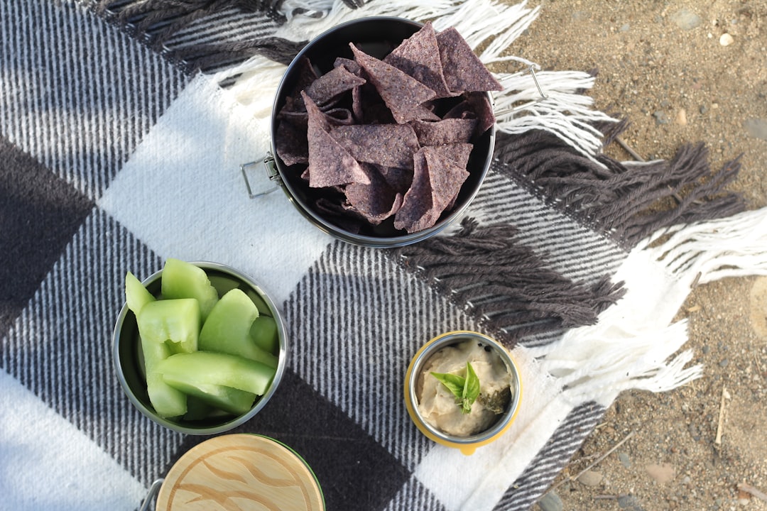 sliced green fruit on stainless steel round tray