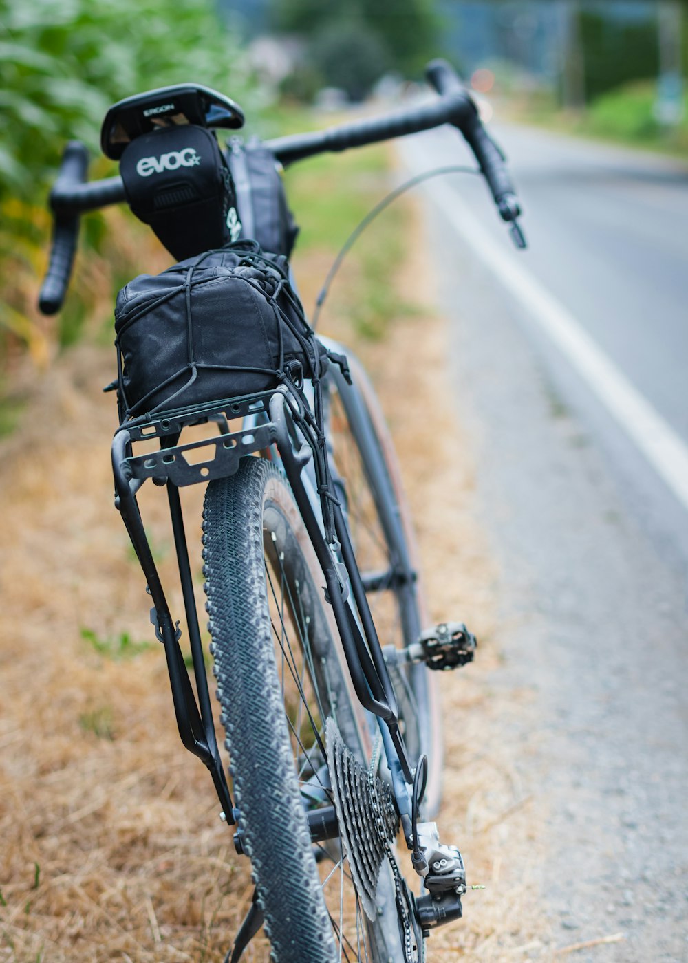 black bicycle on road during daytime