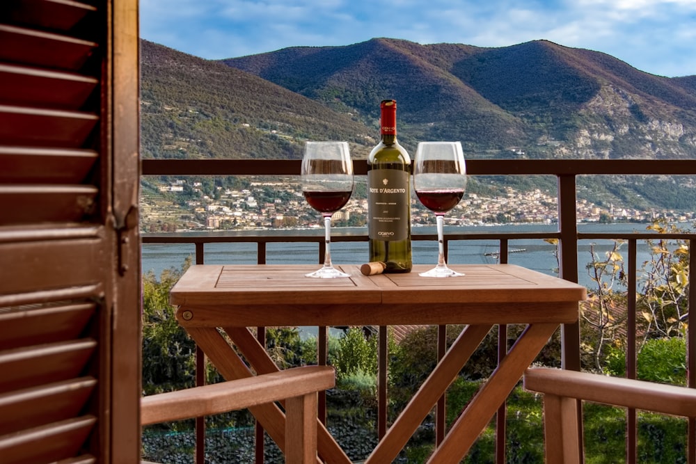 wine glass on brown wooden table