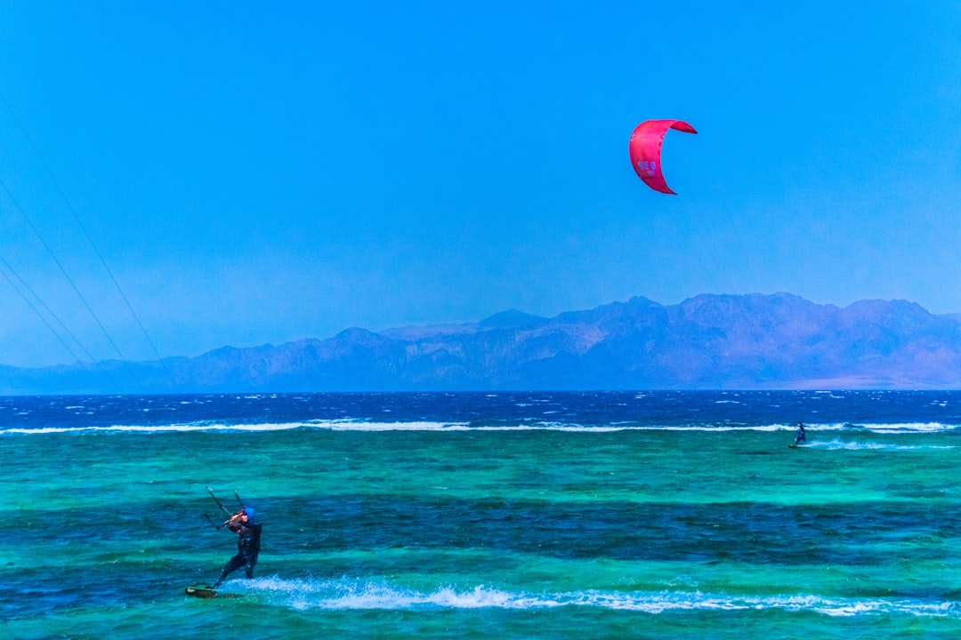 person surfing on sea during daytime