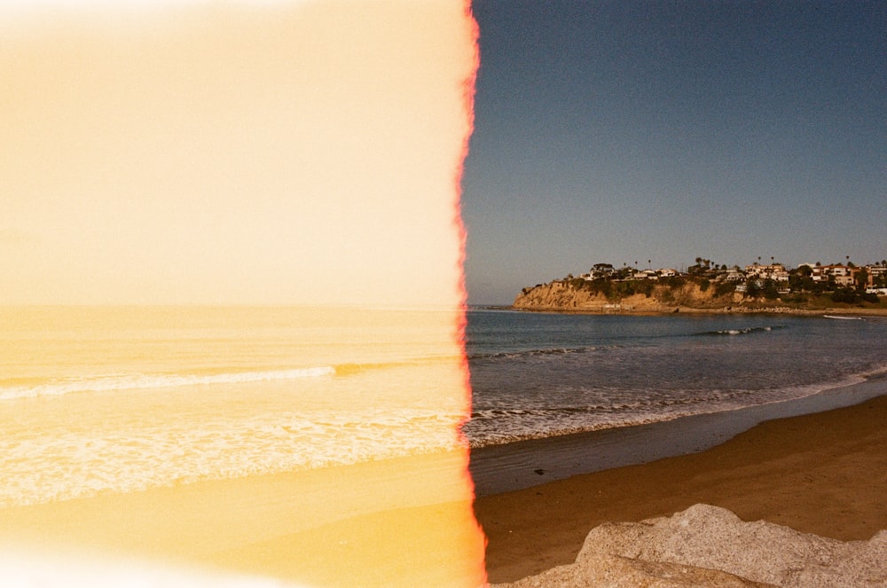 ocean waves crashing on shore during daytime