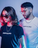 man in black crew neck t-shirt beside woman in white crew neck t-shirt