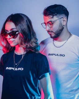 man in black crew neck t-shirt beside woman in white crew neck t-shirt