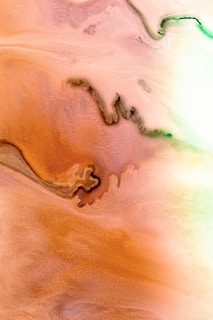 Close-up of textured art print with warm earth tones blending into soft gradients.