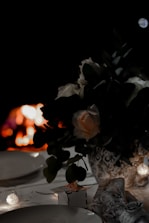 An intimate dinner setting with soft lighting and elegant tableware.