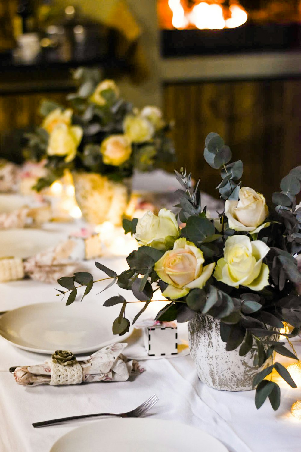 white roses on white ceramic plate