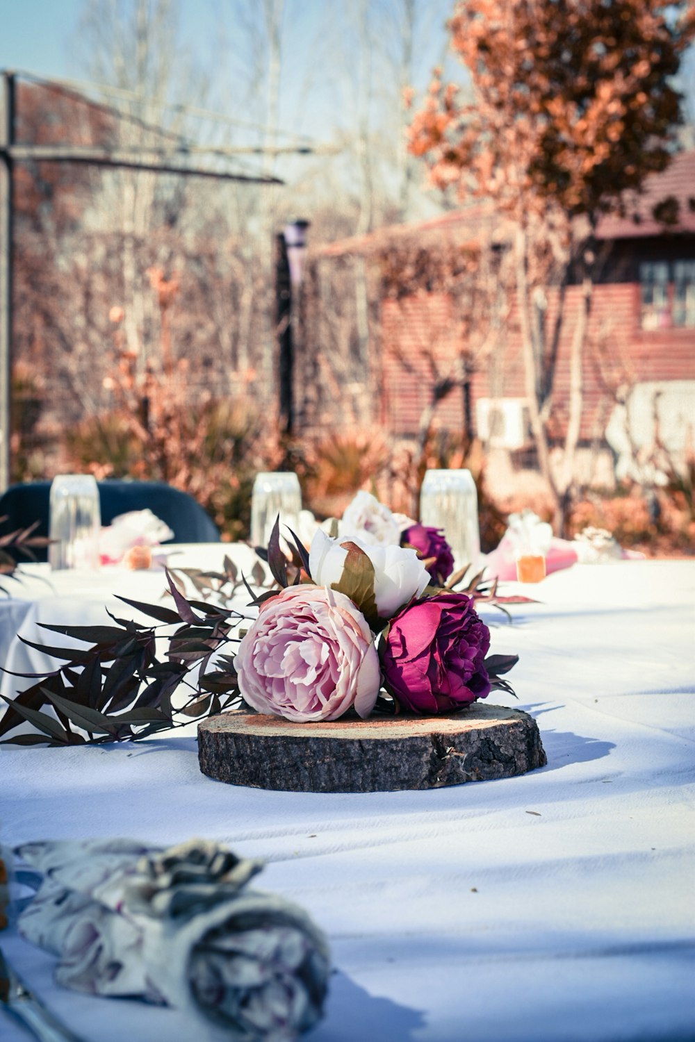 pink roses on black round plate