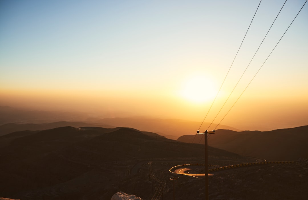 silhouette of mountain during sunset