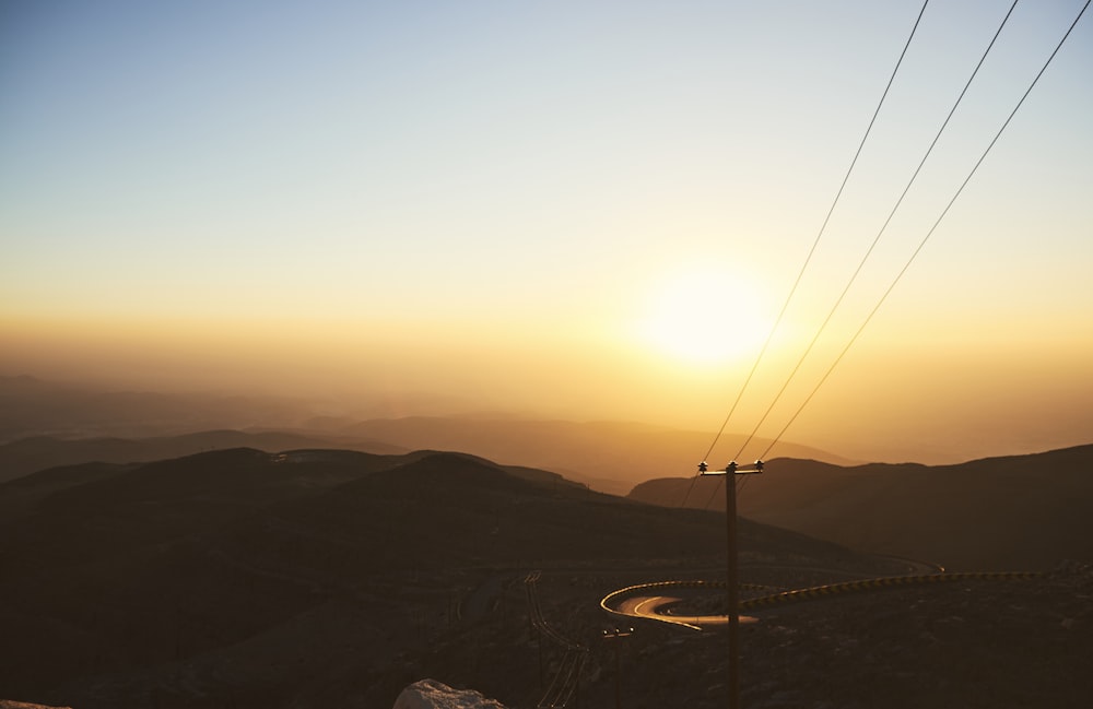 silhouette of mountain during sunset