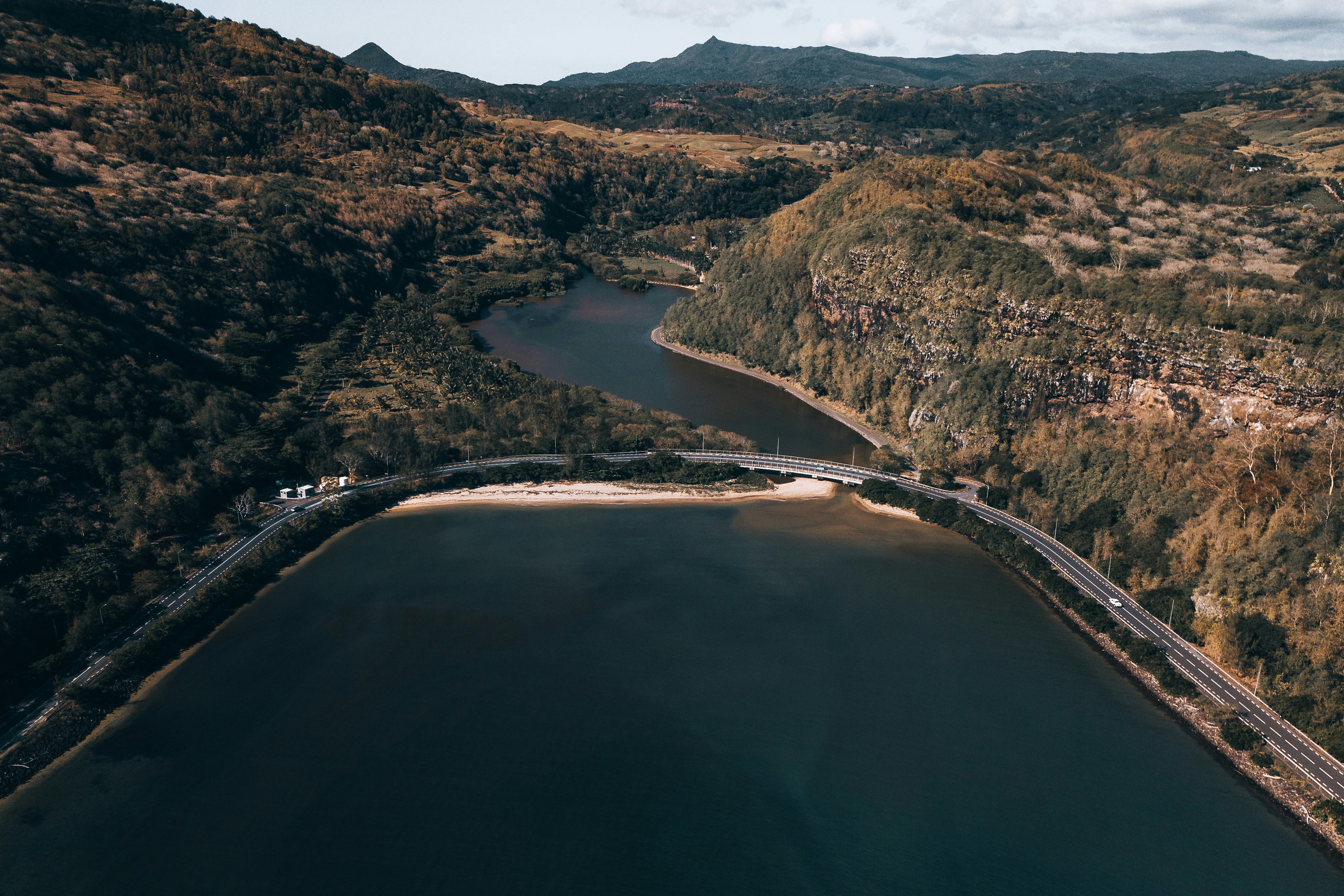 aerial view of river between mountains during daytime