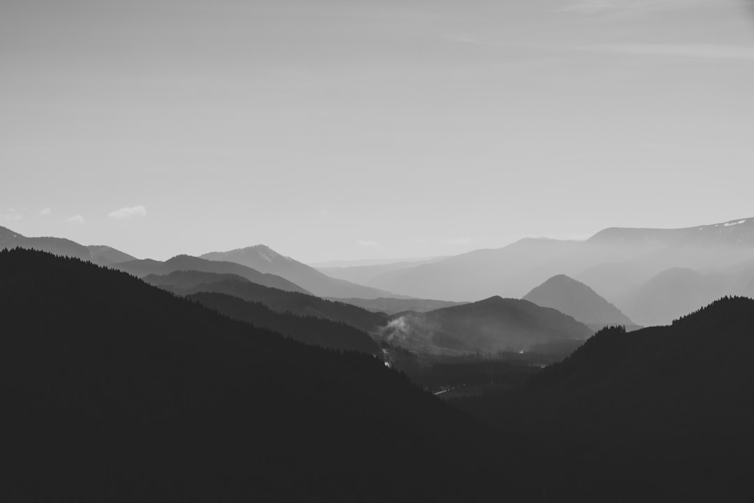 mountains under white sky during daytime