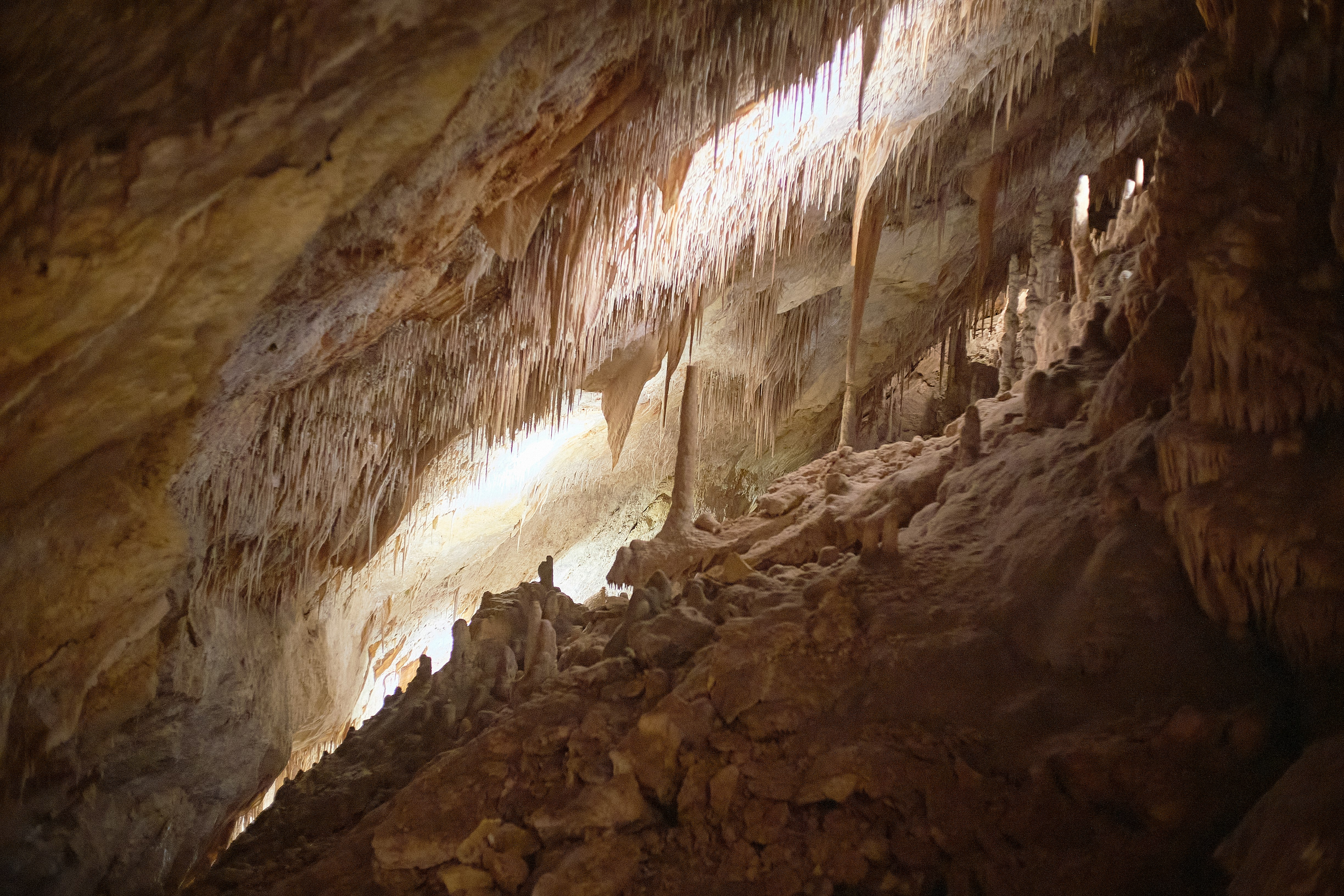 brown and white cave during daytime