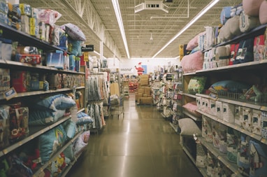 assorted items on white wooden shelf