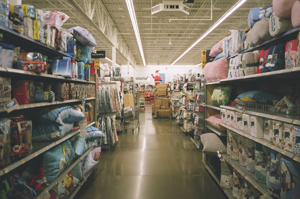 assorted items on white wooden shelf