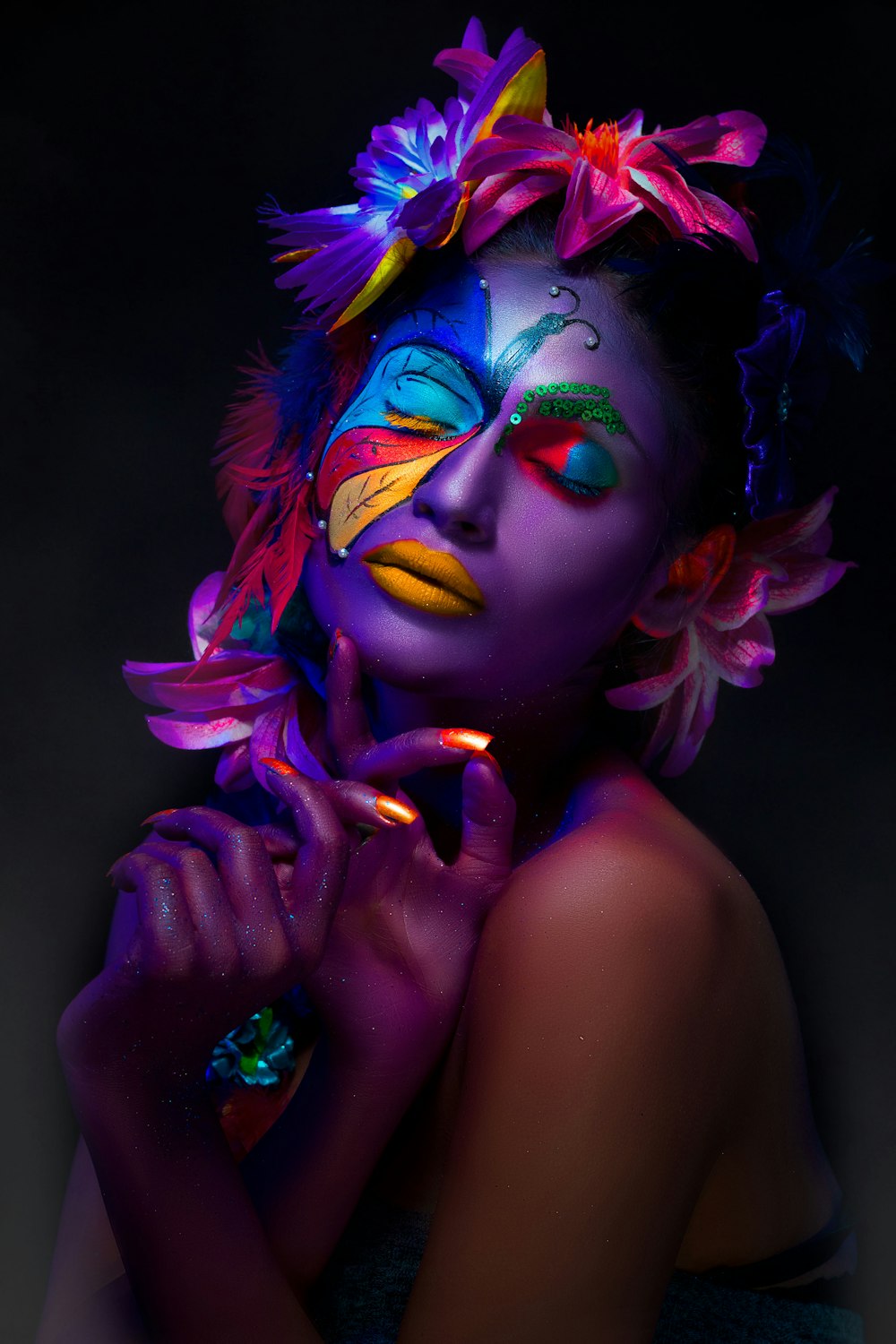 woman with purple and yellow face paint
