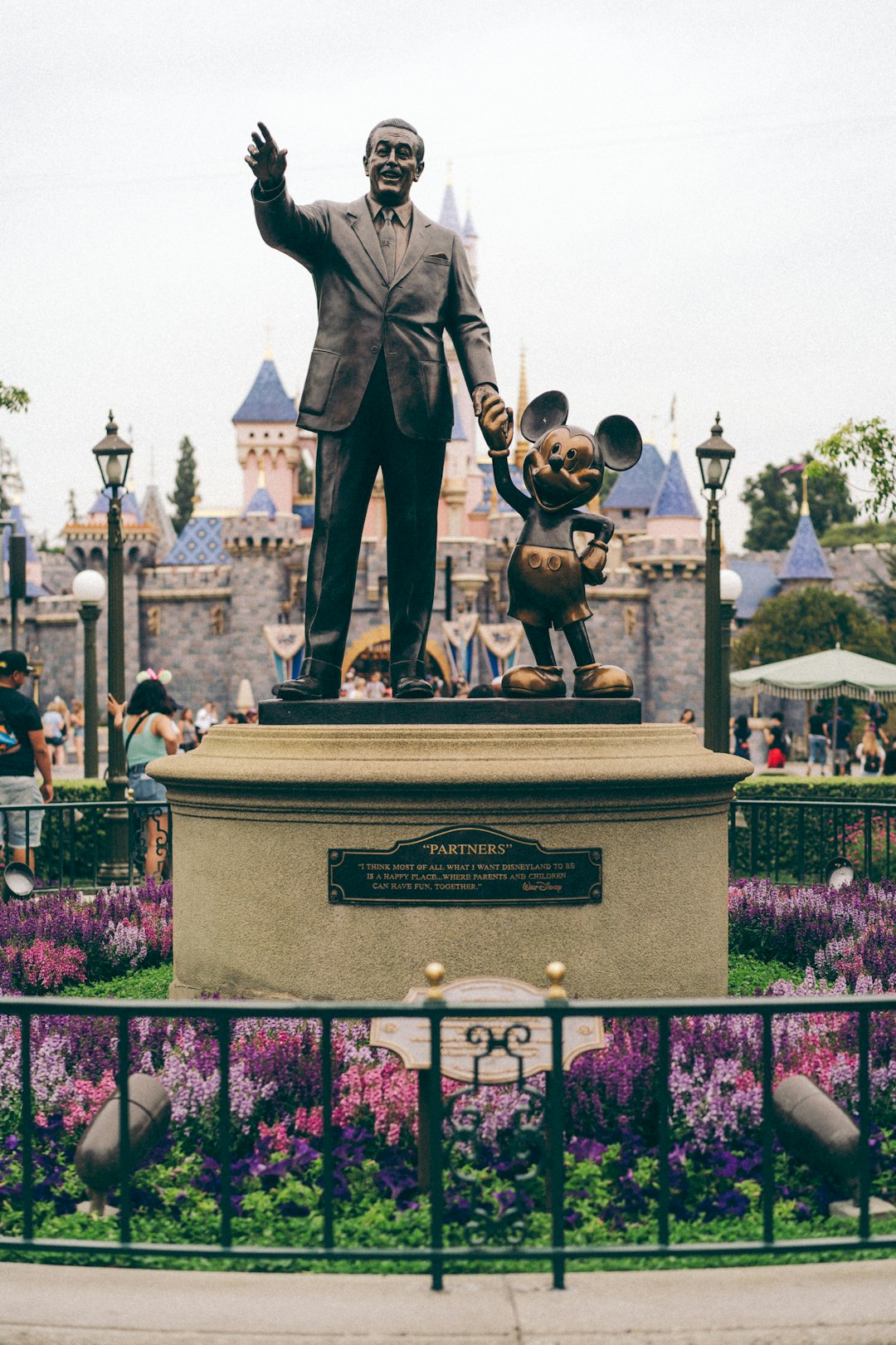 man in black suit statue