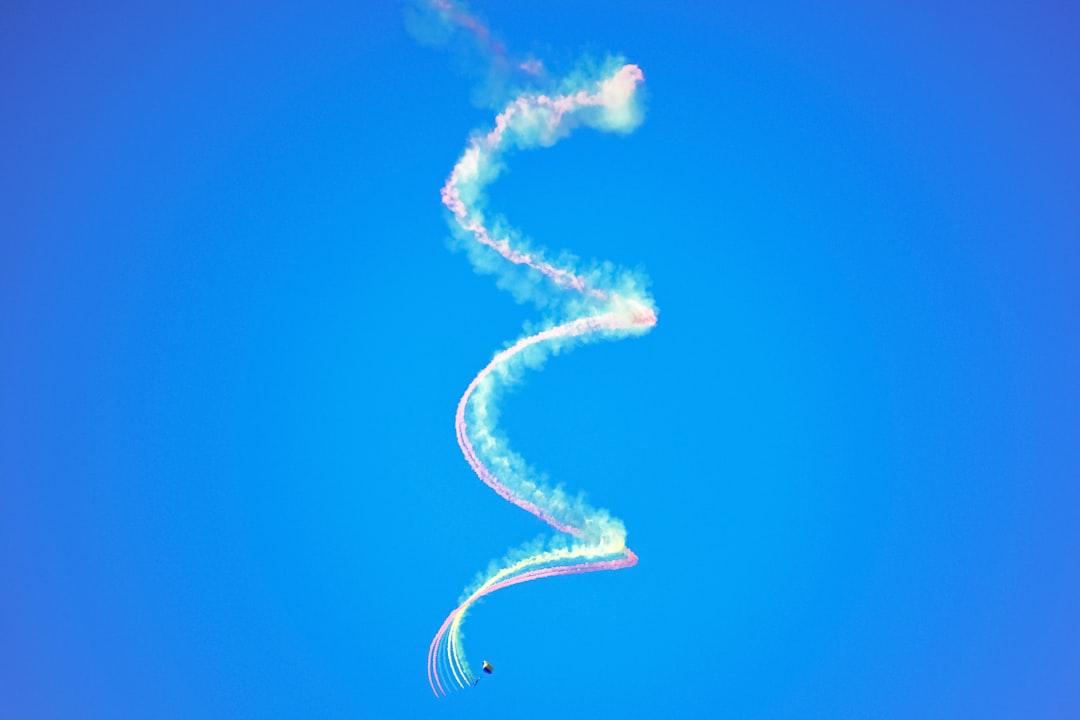 white smoke on blue sky
