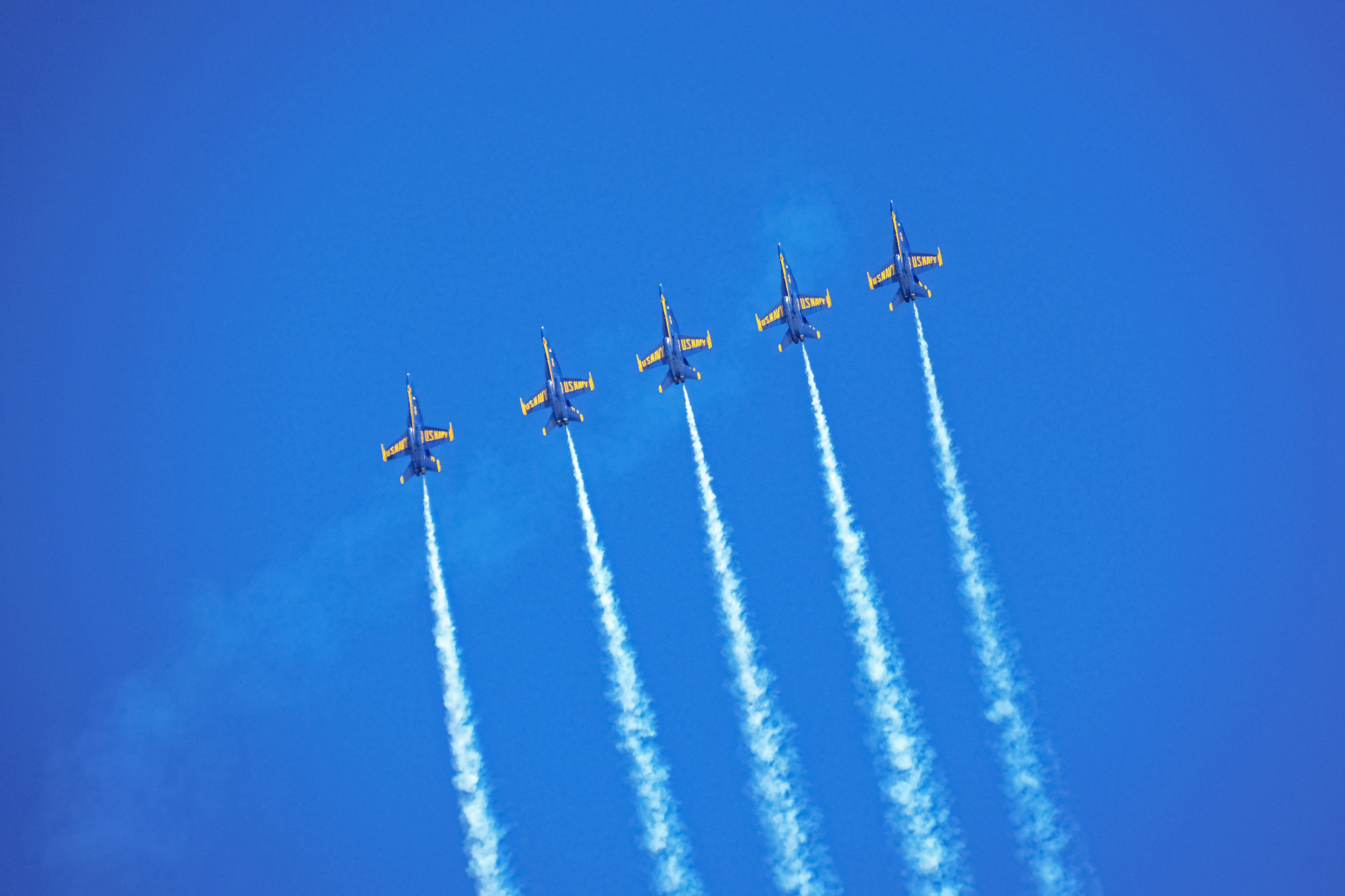 four fighter planes in mid air