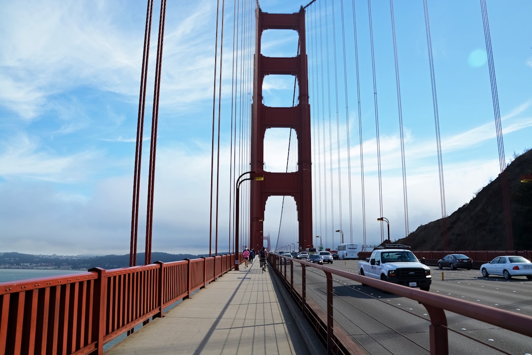 cars on bridge during daytime