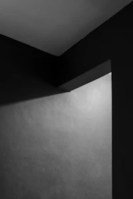 A minimalist fine art photograph showcasing delicate textures and soft shadows in a modern setting.