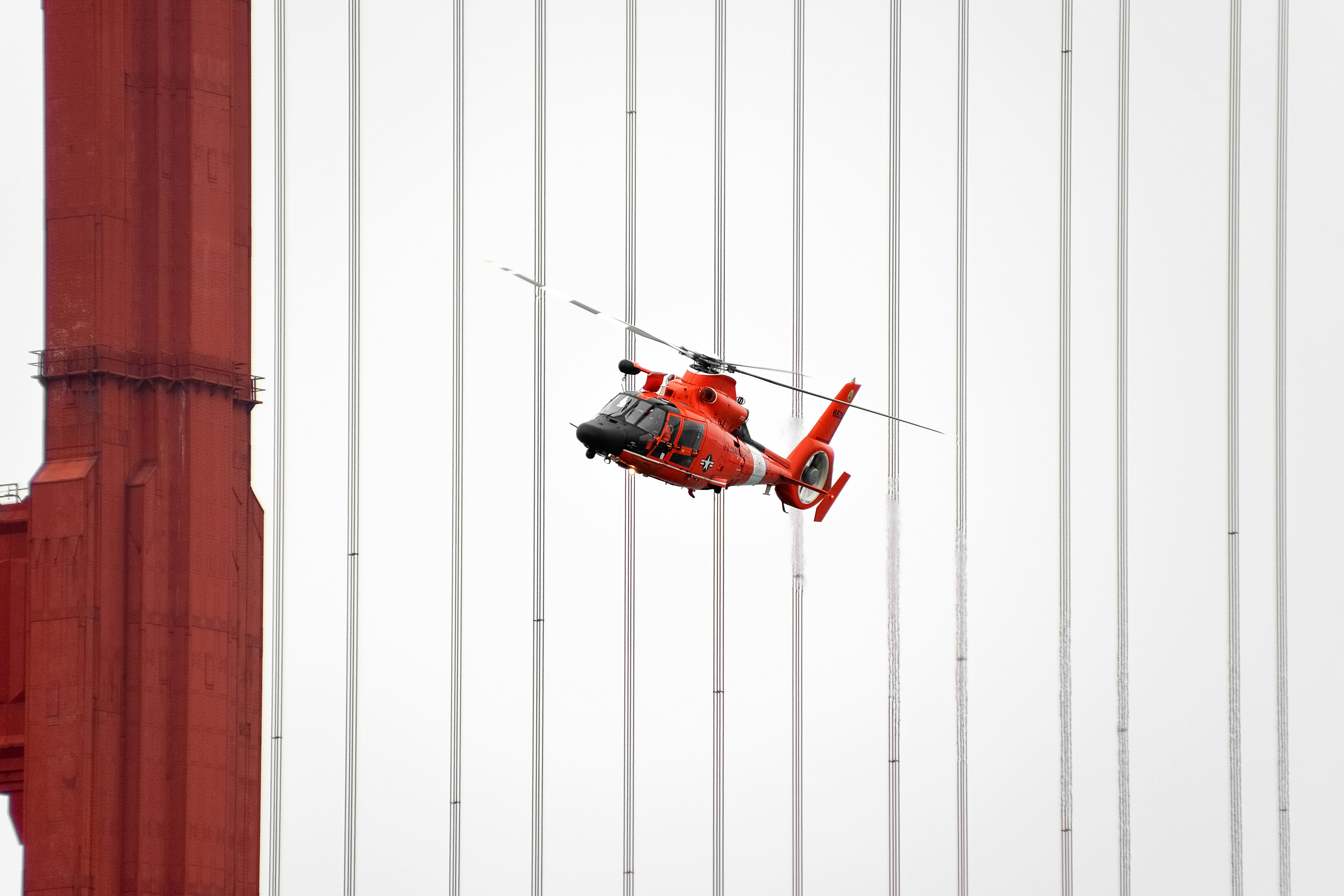 red and black helicopter on white wall