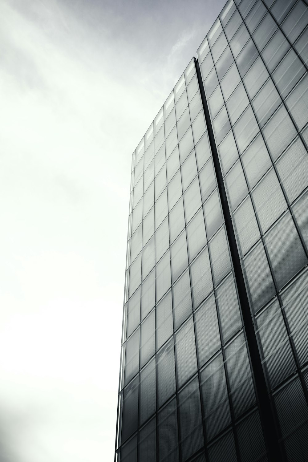 gray concrete building under white sky during daytime