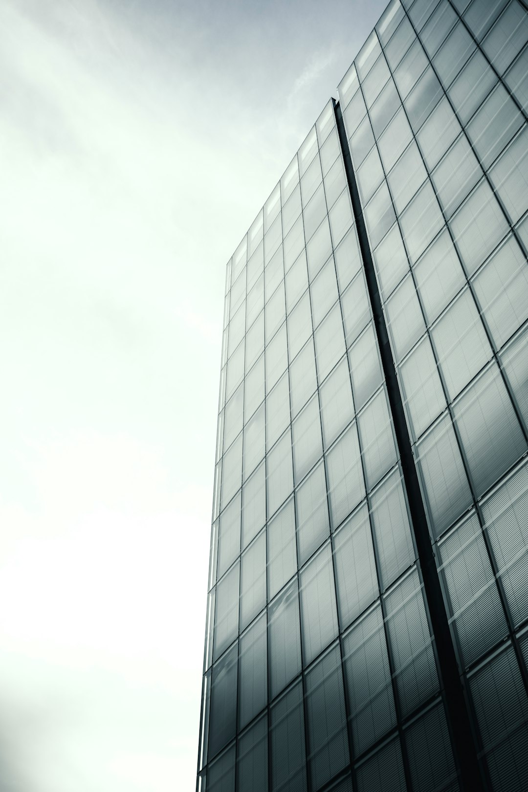 gray concrete building under white sky during daytime