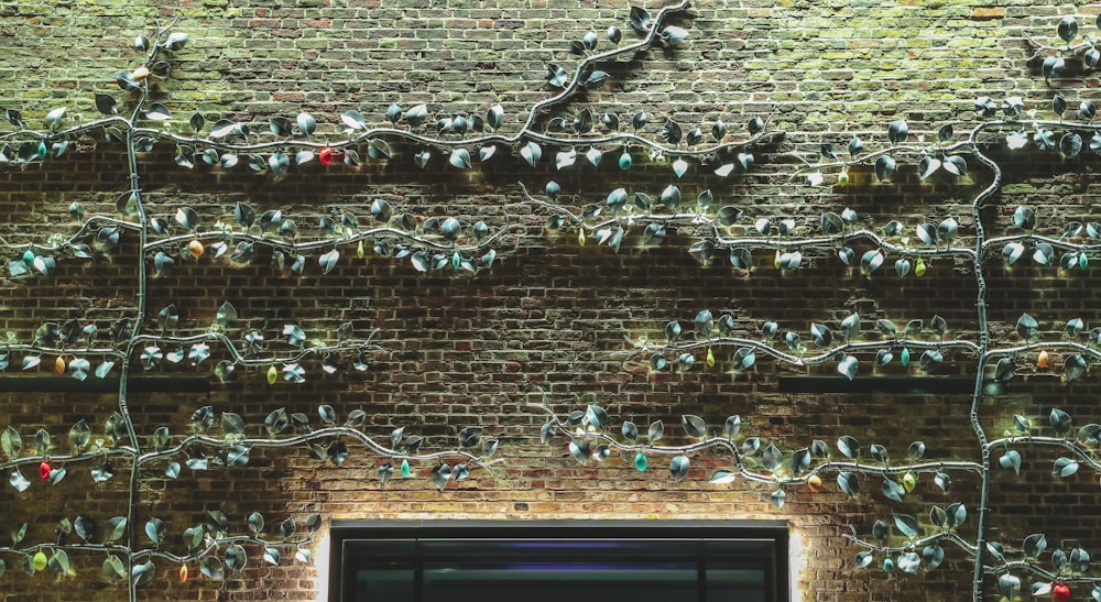 brown brick wall with white string lights