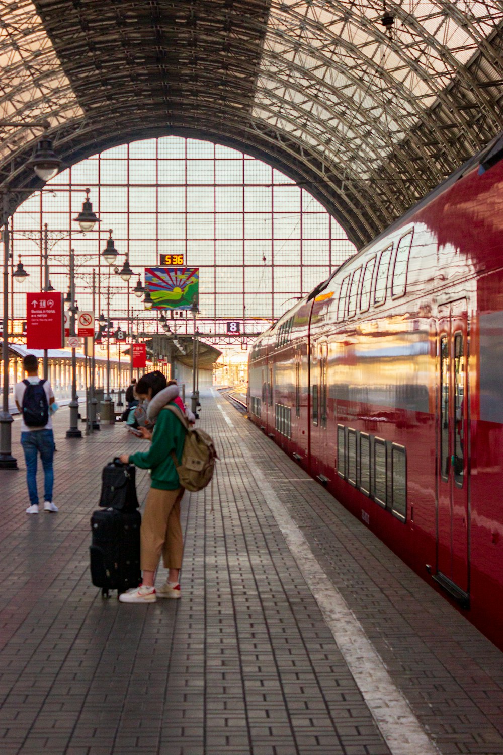 people walking on train station during daytime