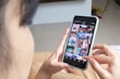 person holding silver iphone 6