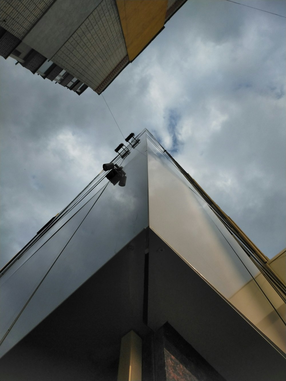 white and black cable car under cloudy sky during daytime