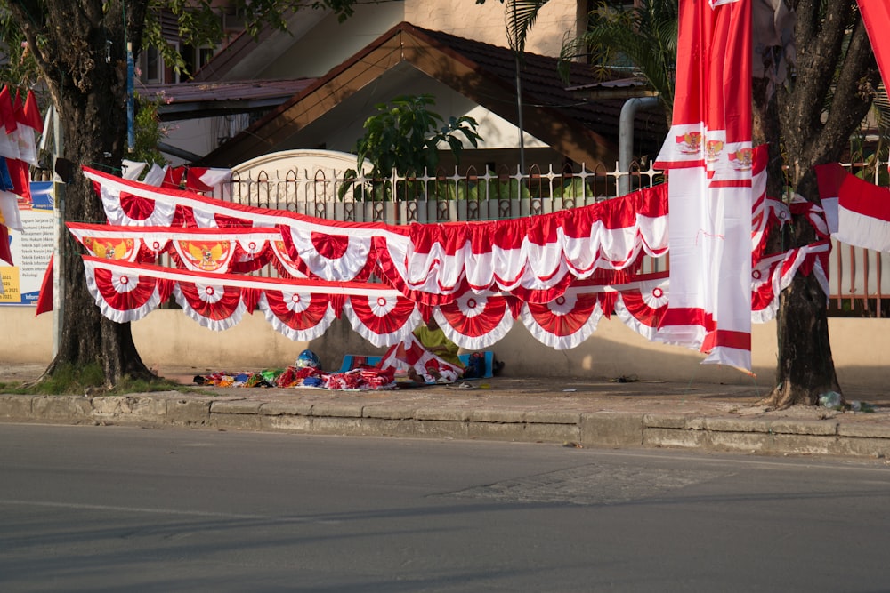 white and red floral textile