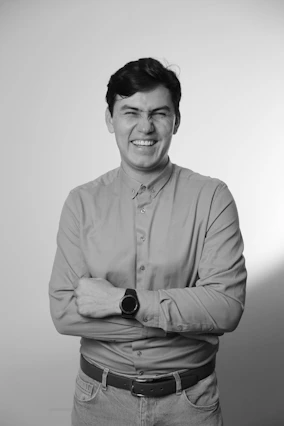 man in dress shirt smiling